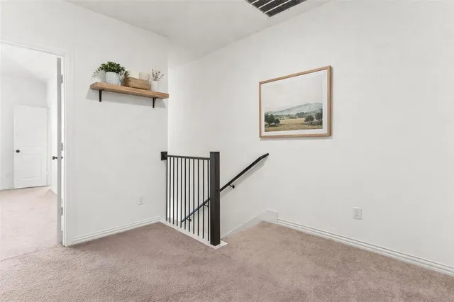 an entryway with floor to ceiling window