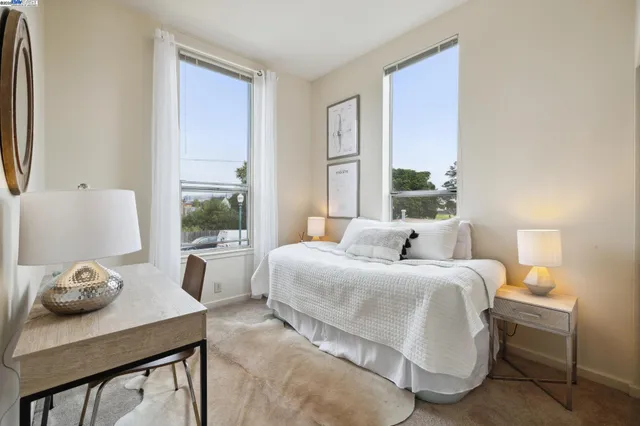 a view of a house with more windows and a yard