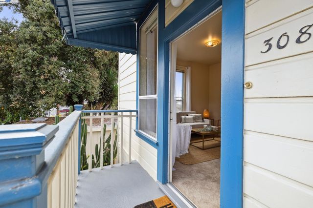 a view of balcony and utility room