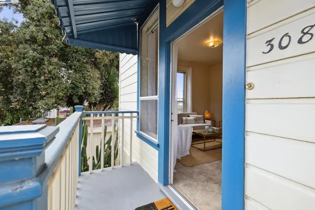 a view of balcony and utility room