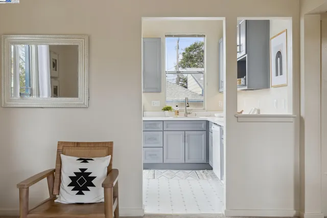 a room with a window and flowerpot