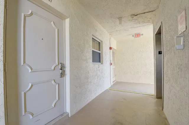 a view of a lake with sitting area