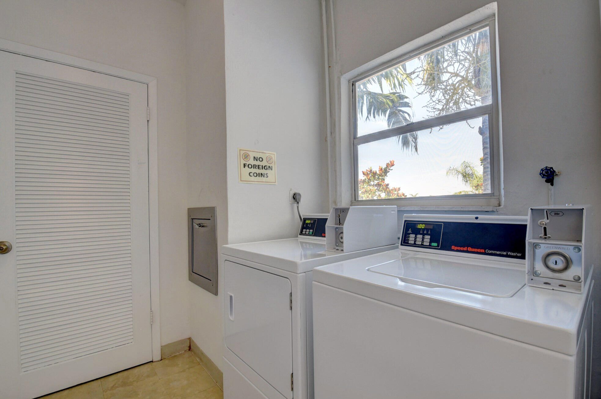 650 Snug Harbor Drive, Unit G307 Boynton Beach, FL 33435 - Photo 44 of 58 a utility room with dryer and washer