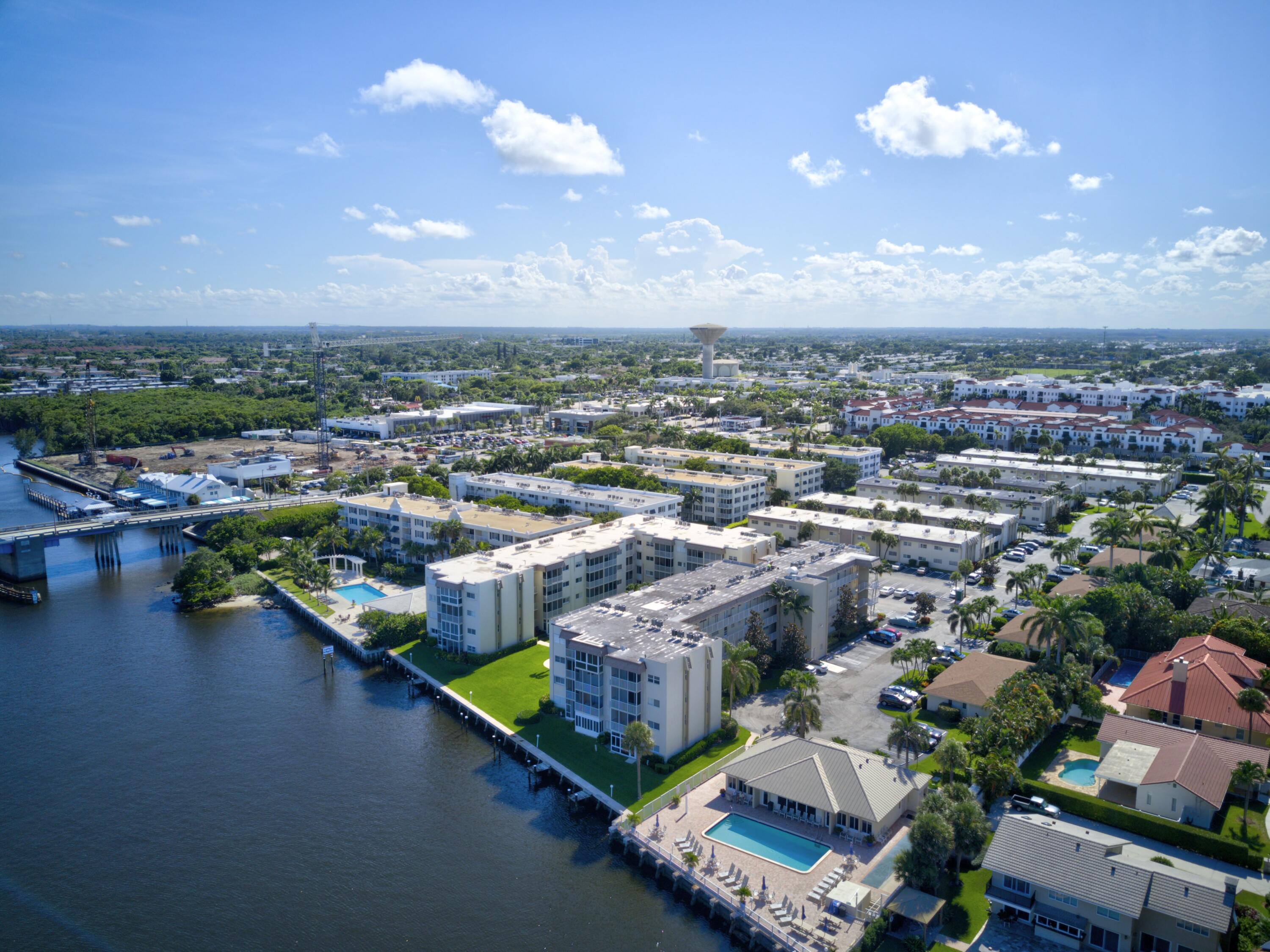 650 Snug Harbor Drive, Unit G307 Boynton Beach, FL 33435 - Photo 53 of 58 an aerial view of residential houses with outdoor space and lake view