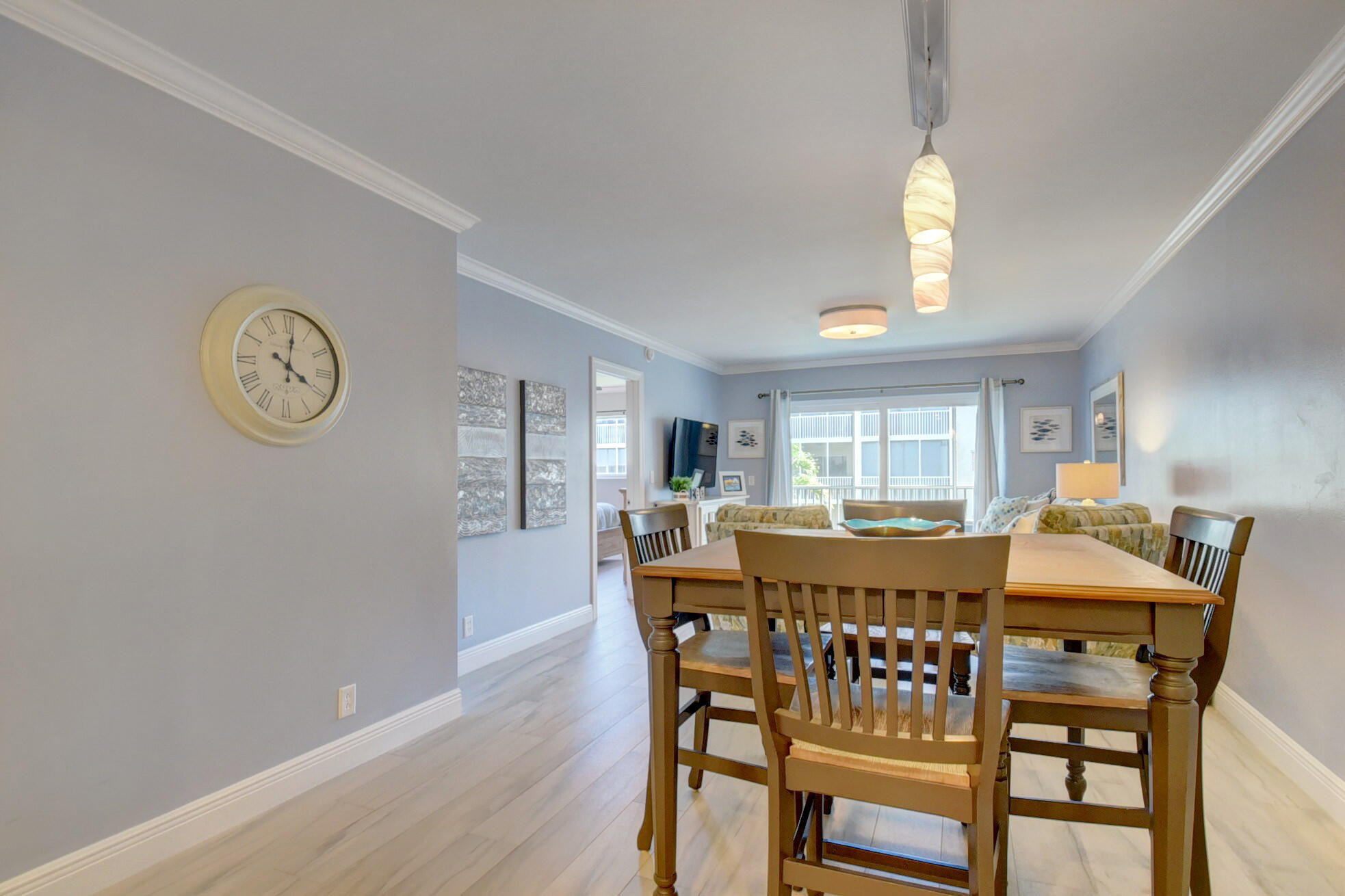 650 Snug Harbor Drive, Unit G307 Boynton Beach, FL 33435 - Photo 7 of 58 a view of a dining room with furniture and a large window