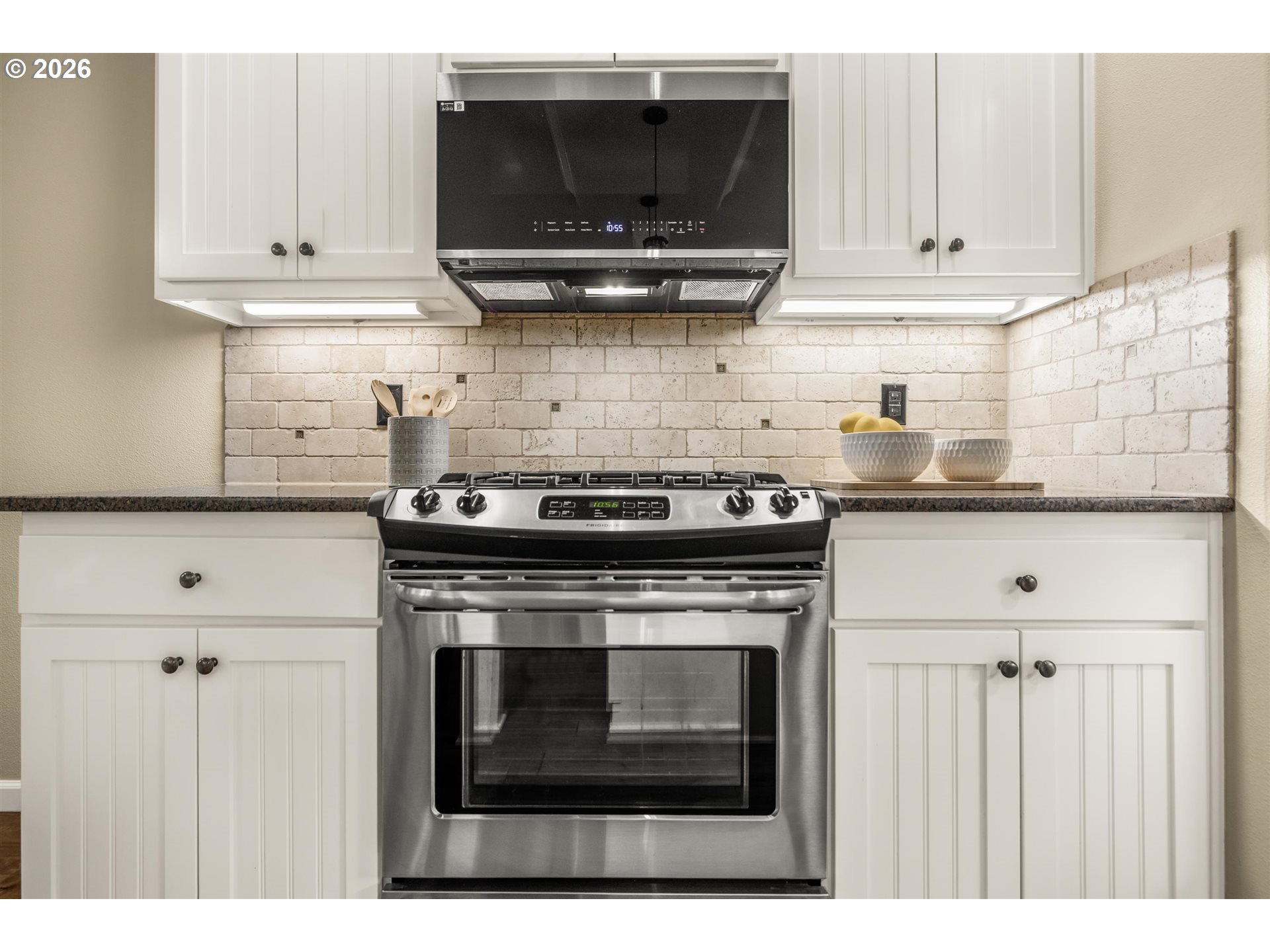16073 Southeast Pinot Road Milwaukie, OR 97267 - Photo 15 of 44 a kitchen with a stove and a microwave