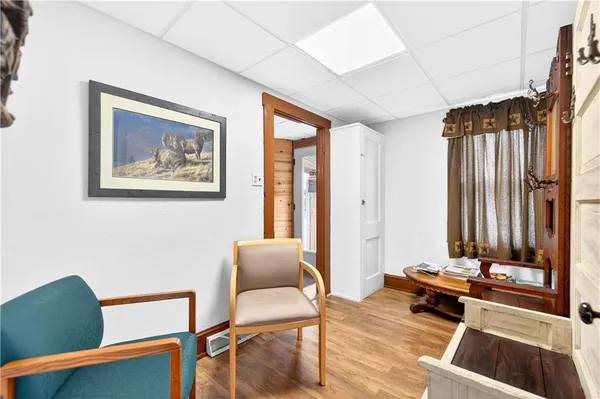 a living room with furniture and a window