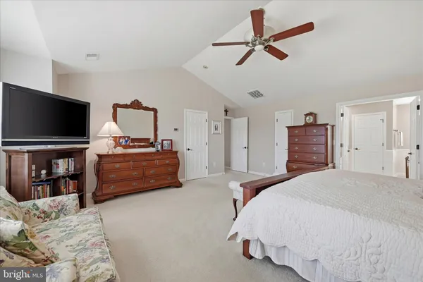 a room with gym equipment and a table