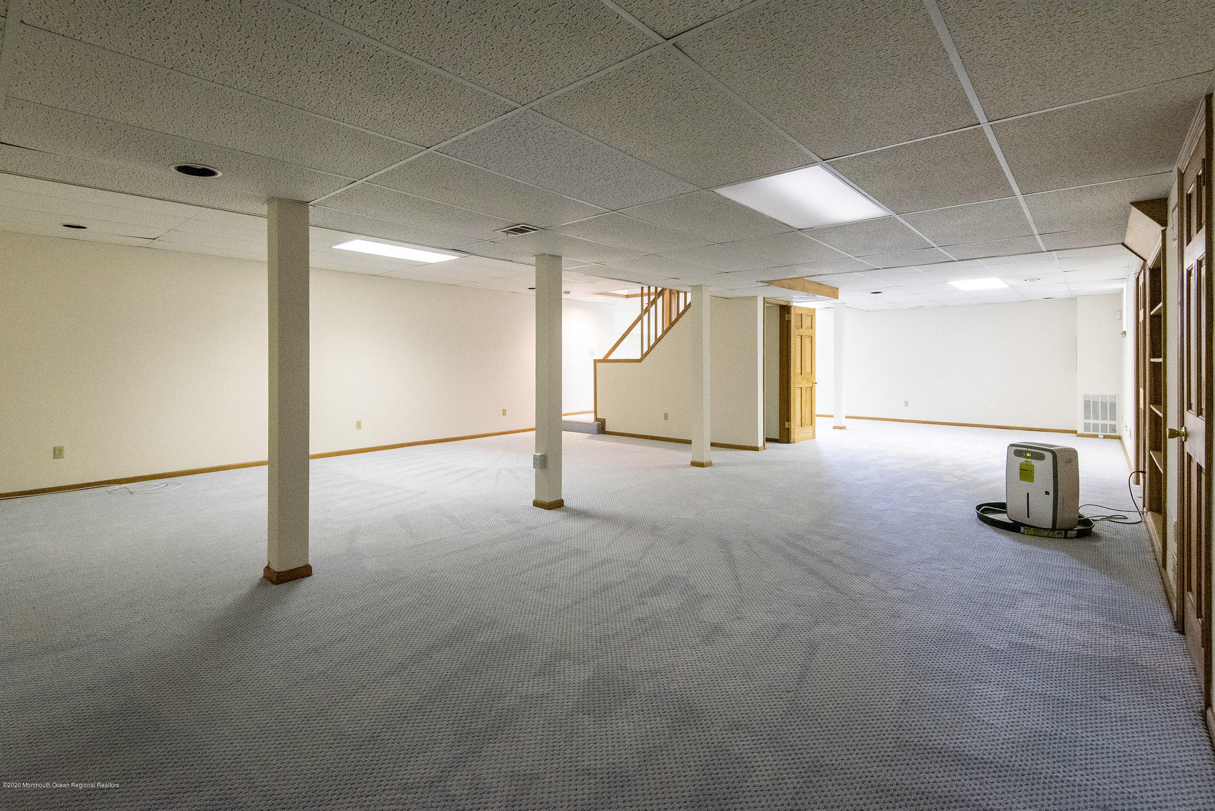 19 Riverside Lane Holmdel, NJ 07733 - Photo 29 of 40 a view of a big room with windows