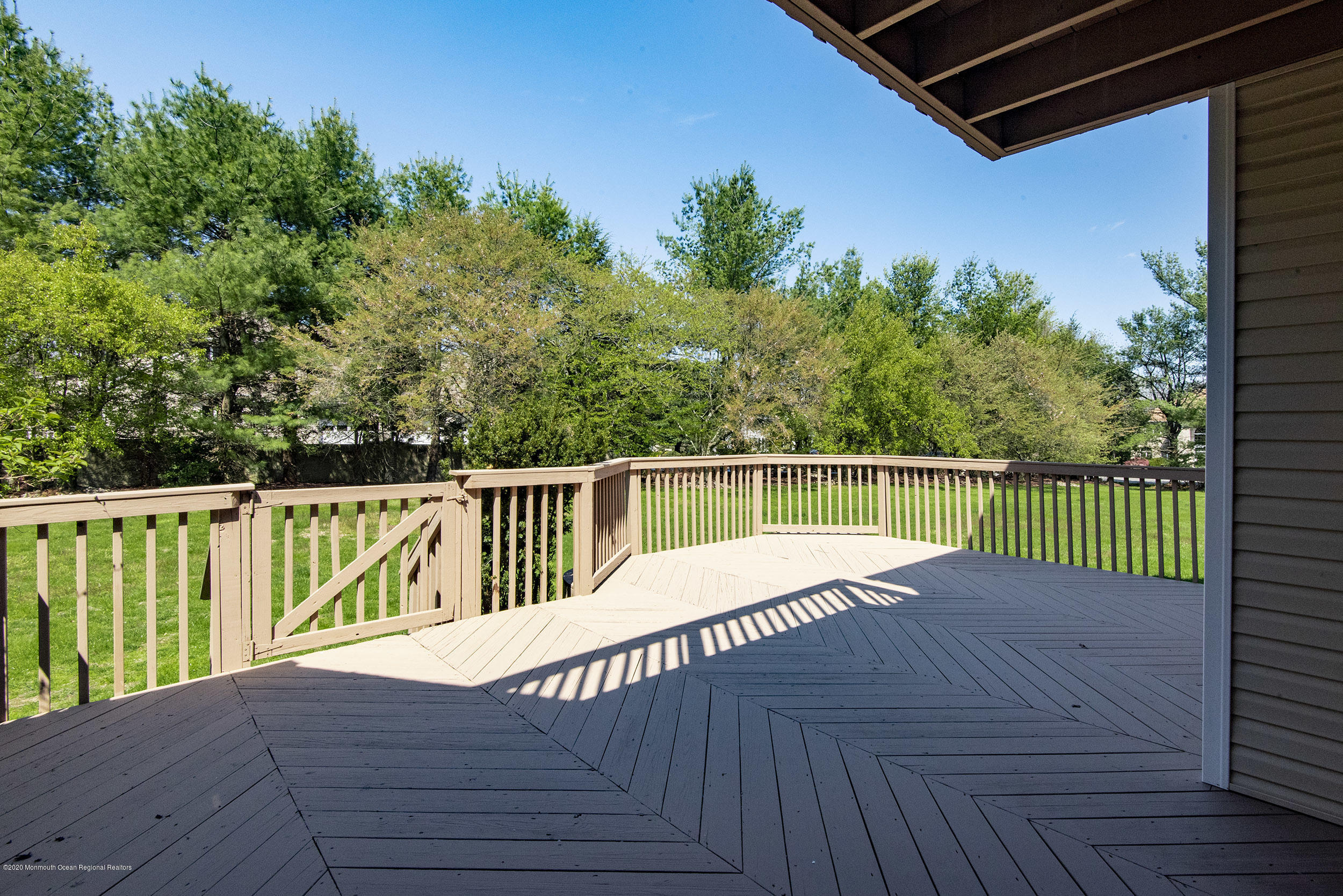 19 Riverside Lane Holmdel, NJ 07733 - Photo 33 of 40 a view of a balcony with wooden floor