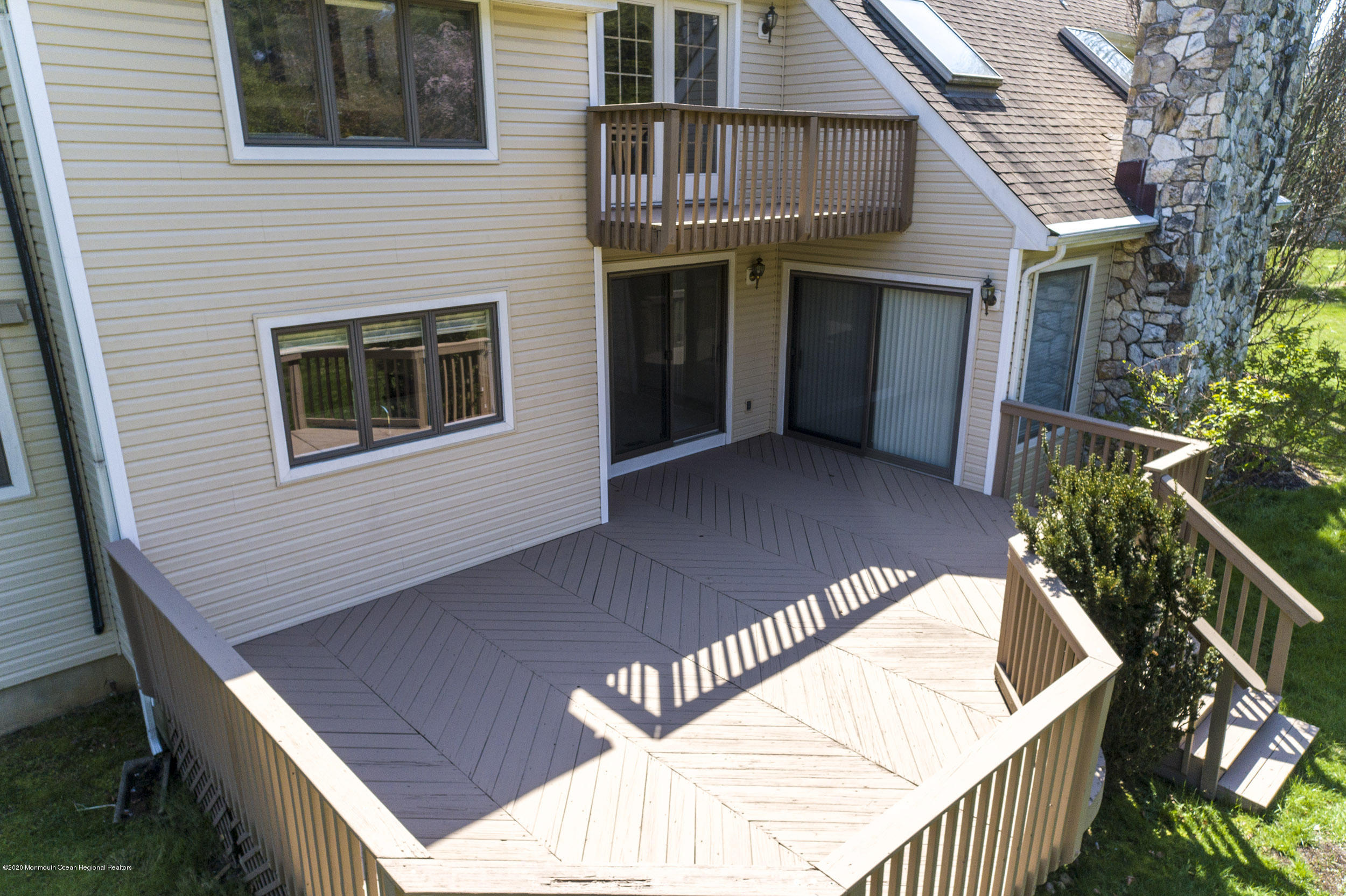 19 Riverside Lane Holmdel, NJ 07733 - Photo 34 of 40 a view of house with a roof deck