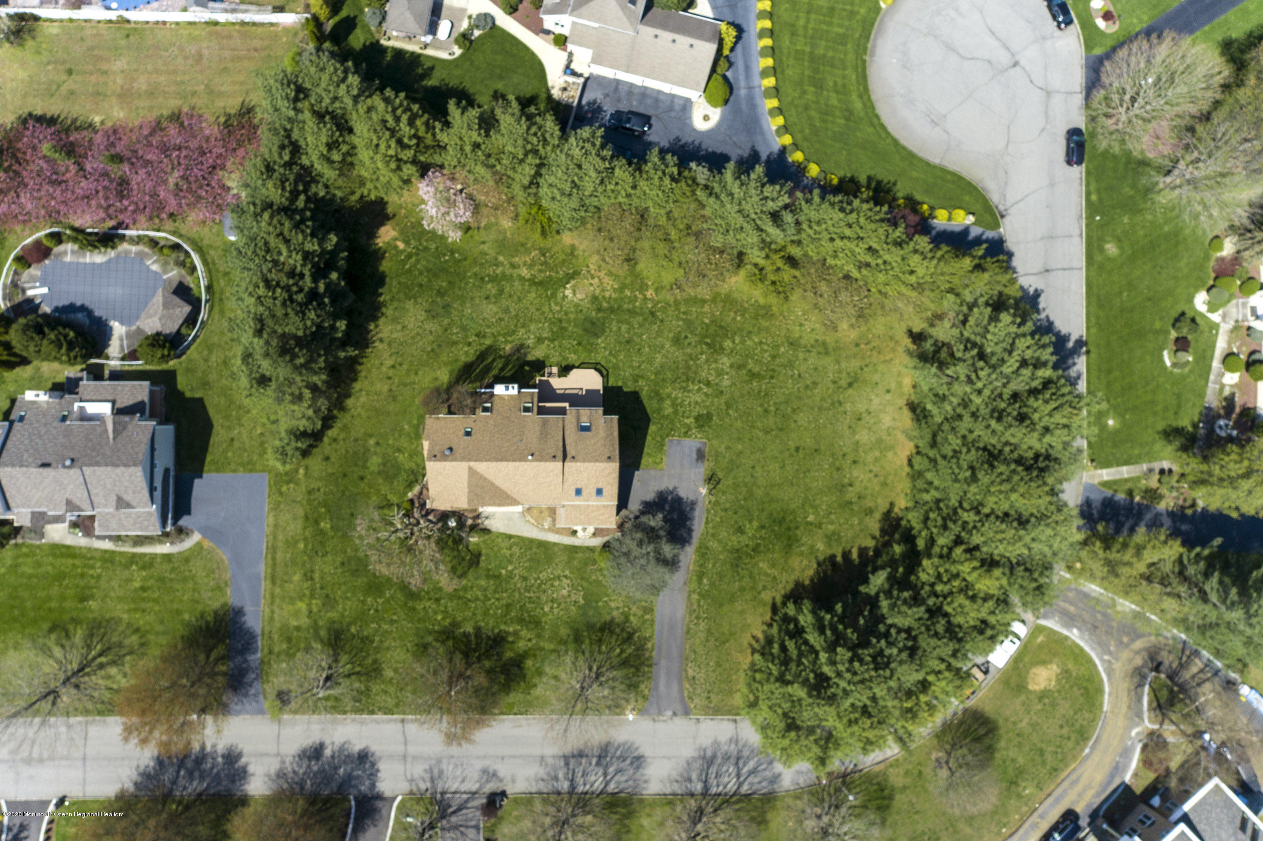 19 Riverside Lane Holmdel, NJ 07733 - Photo 40 of 40 an aerial view of a house with a yard and lake view