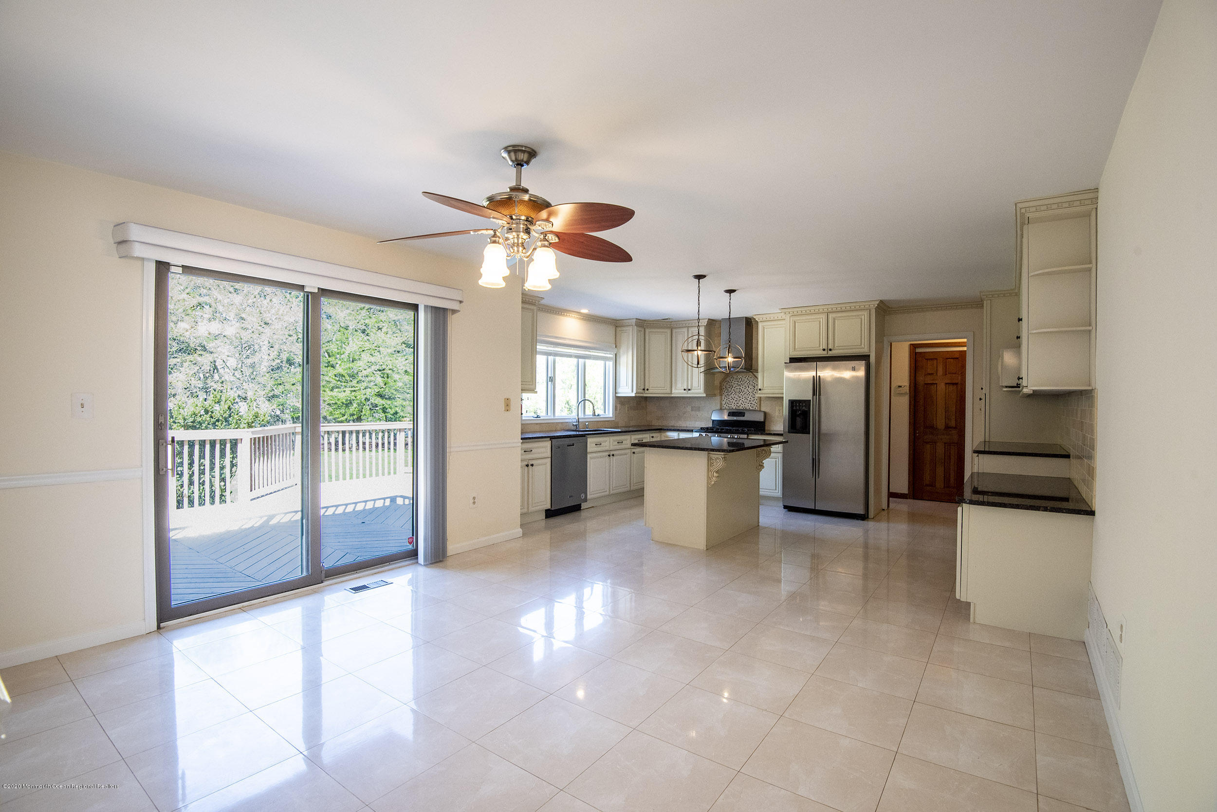 19 Riverside Lane Holmdel, NJ 07733 - Photo 5 of 40 a view of a kitchen with a sink and refrigerator