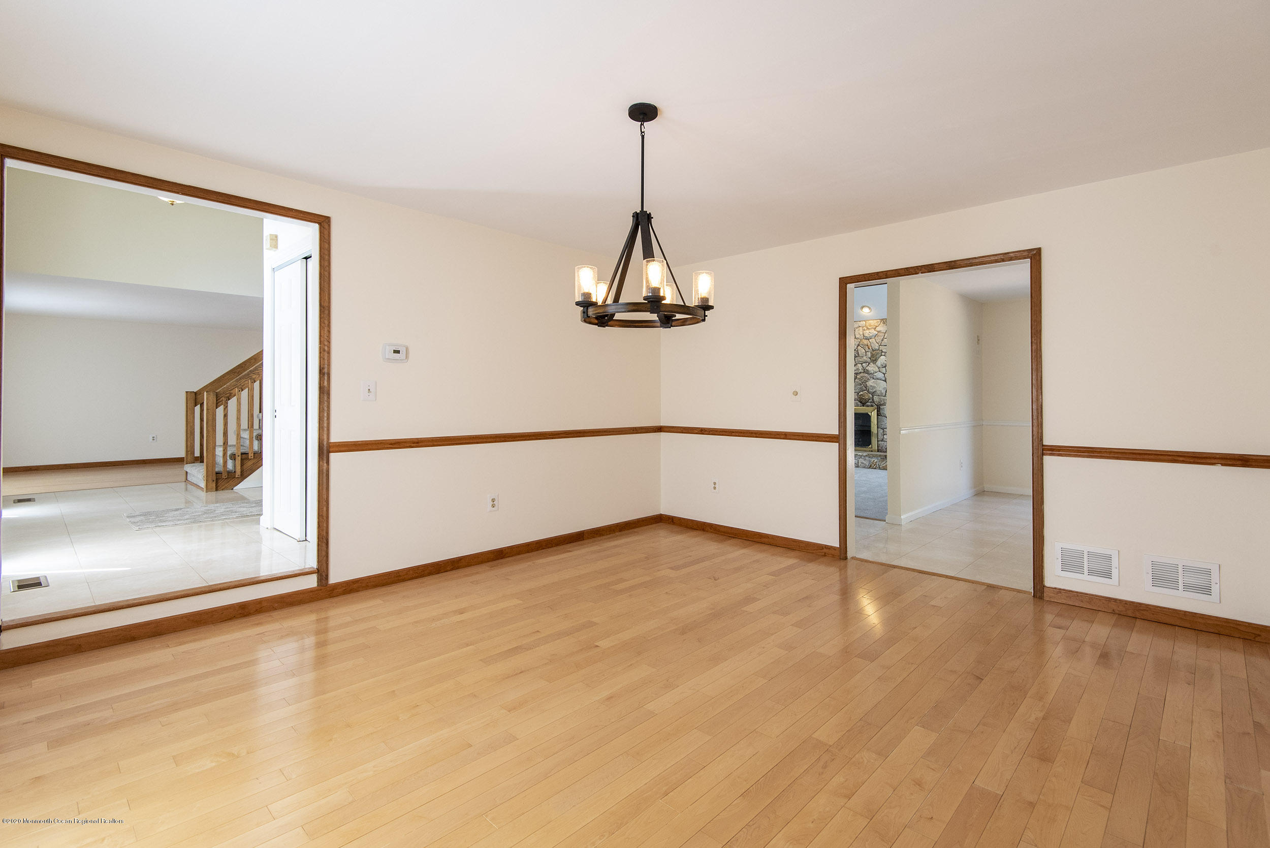 19 Riverside Lane Holmdel, NJ 07733 - Photo 9 of 40 a view of a room with wooden floor and a window