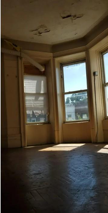 1595 Union Street Brooklyn, NY 11213 - Photo 14 of 21 a view of livingroom with window and wooden floor