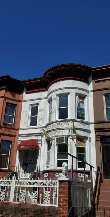 1595 Union Street Brooklyn, NY 11213 - Photo 16 of 21 a view of house with car parked