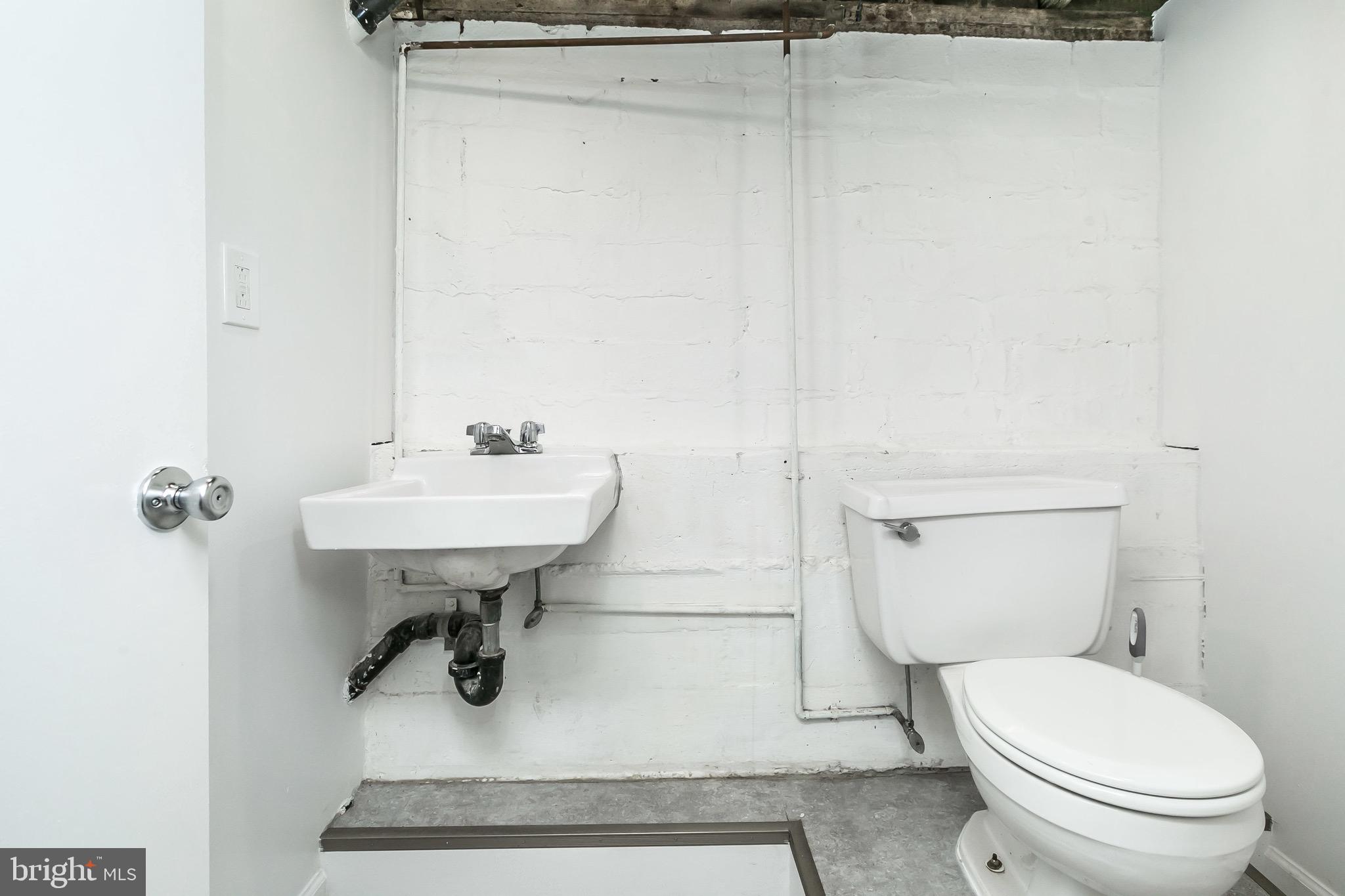 3119 Cedarhurst Road Baltimore, MD 21214 - Photo 30 of 34 Basement Half Bath