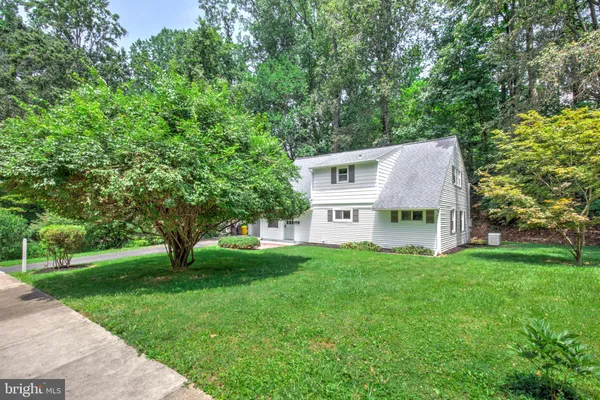 a backyard of a house with seating space