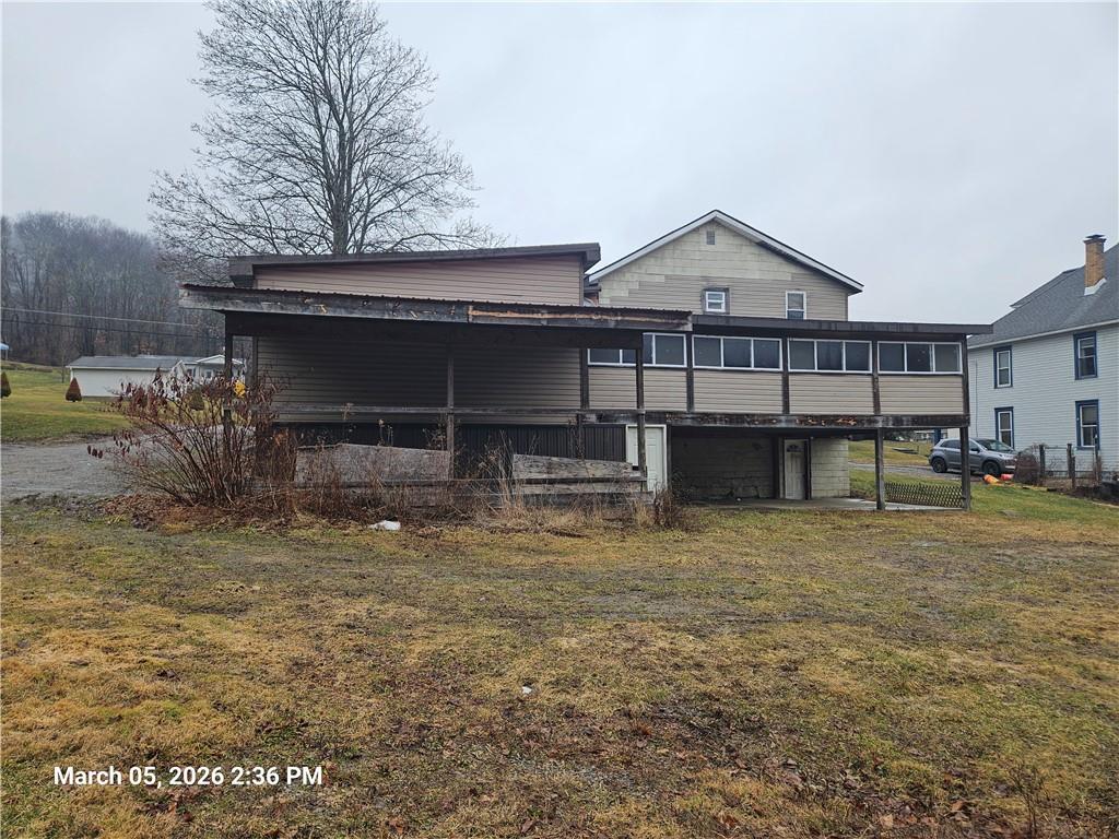 233 Main Street Bruin, PA 16022 - Photo 11 of 12 a view of a house with backyard and sitting area