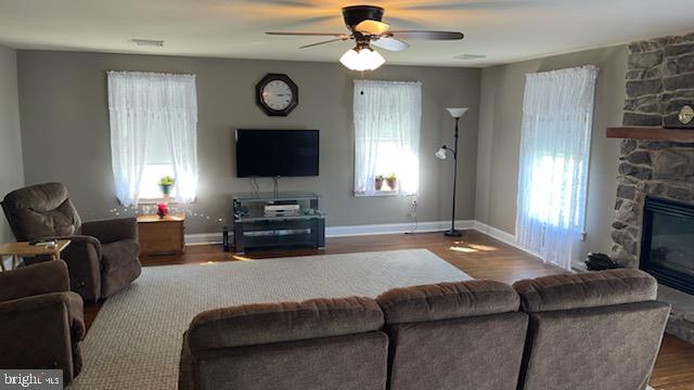 1019 River Road Quarryville, PA 17566 - Photo 9 of 11 Living Room W/ Stone Fireplace & Propane Insert