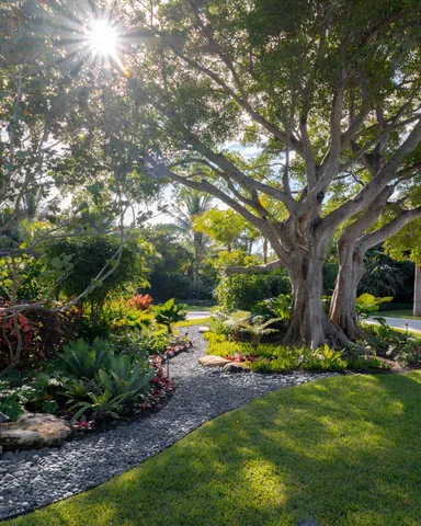 a bedroom with a bed and a lamp