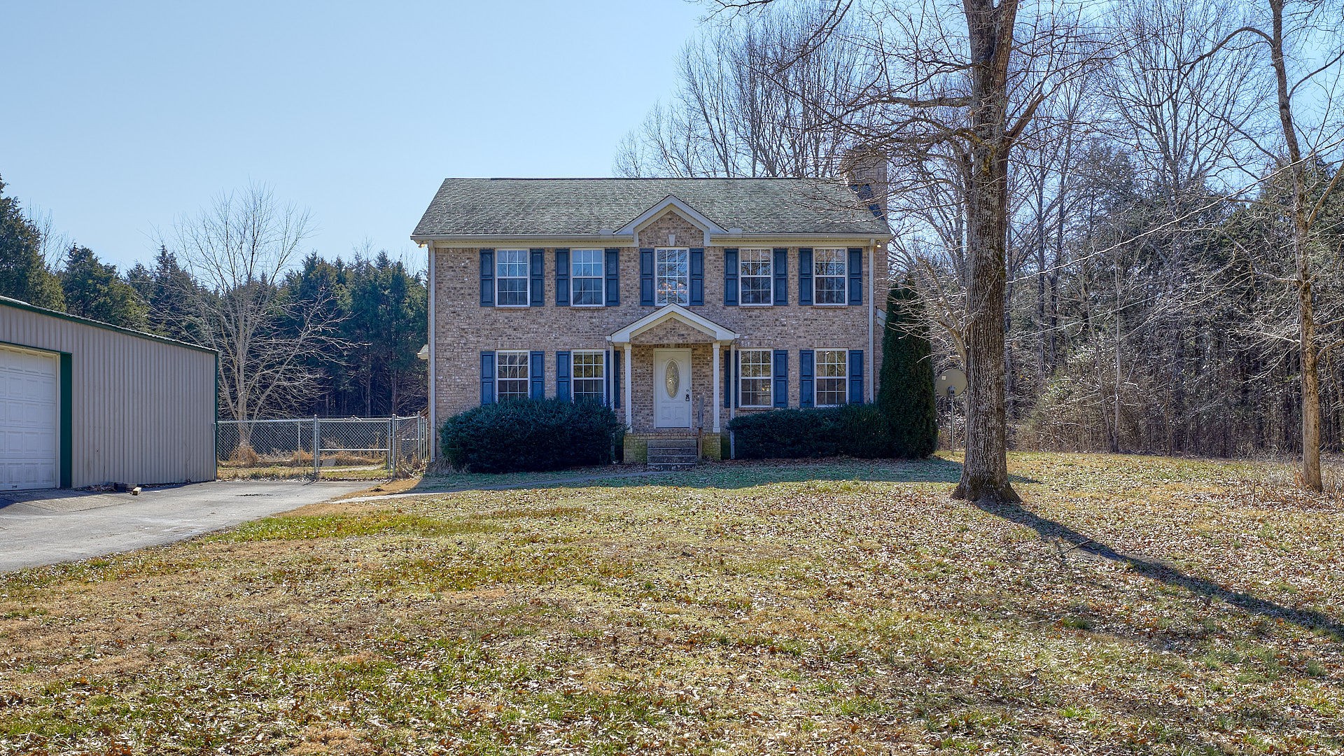 7042 Murfreesboro Road Lebanon, TN 37090 - Photo 1 of 43 a front view of a house with a yard
