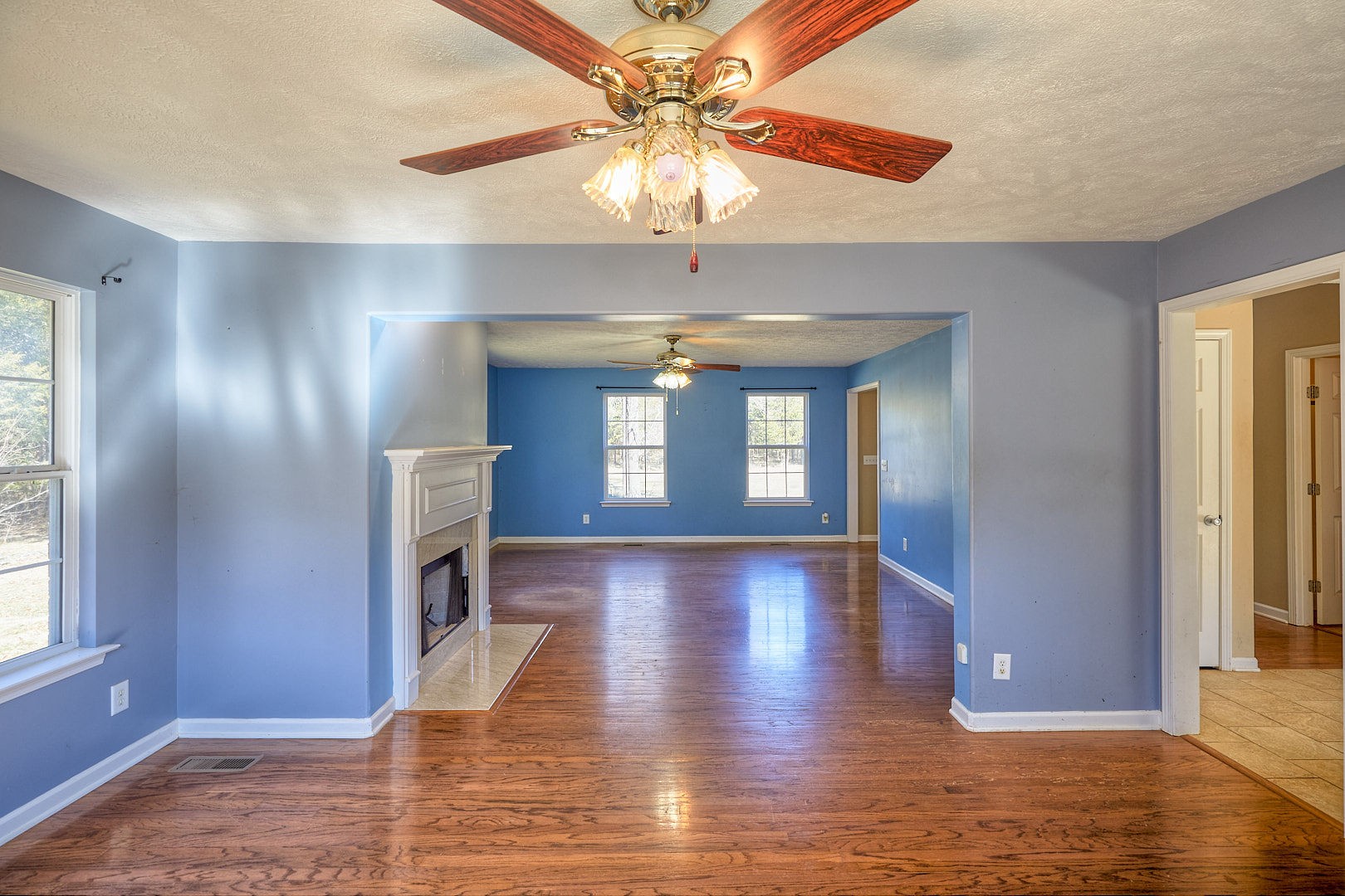 7042 Murfreesboro Road Lebanon, TN 37090 - Photo 11 of 43 a view of an empty room with window and wooden floor