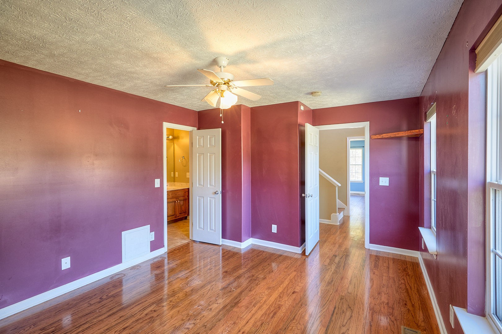 7042 Murfreesboro Road Lebanon, TN 37090 - Photo 15 of 43 a view of an empty room with window and wooden floor
