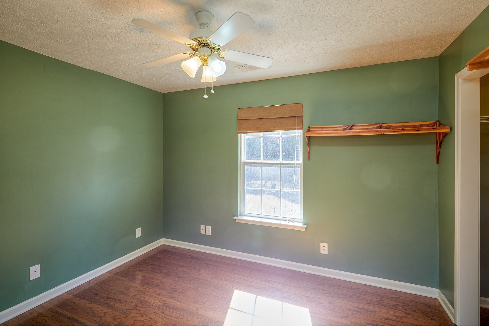 7042 Murfreesboro Road Lebanon, TN 37090 - Photo 23 of 43 an empty room with windows and fan