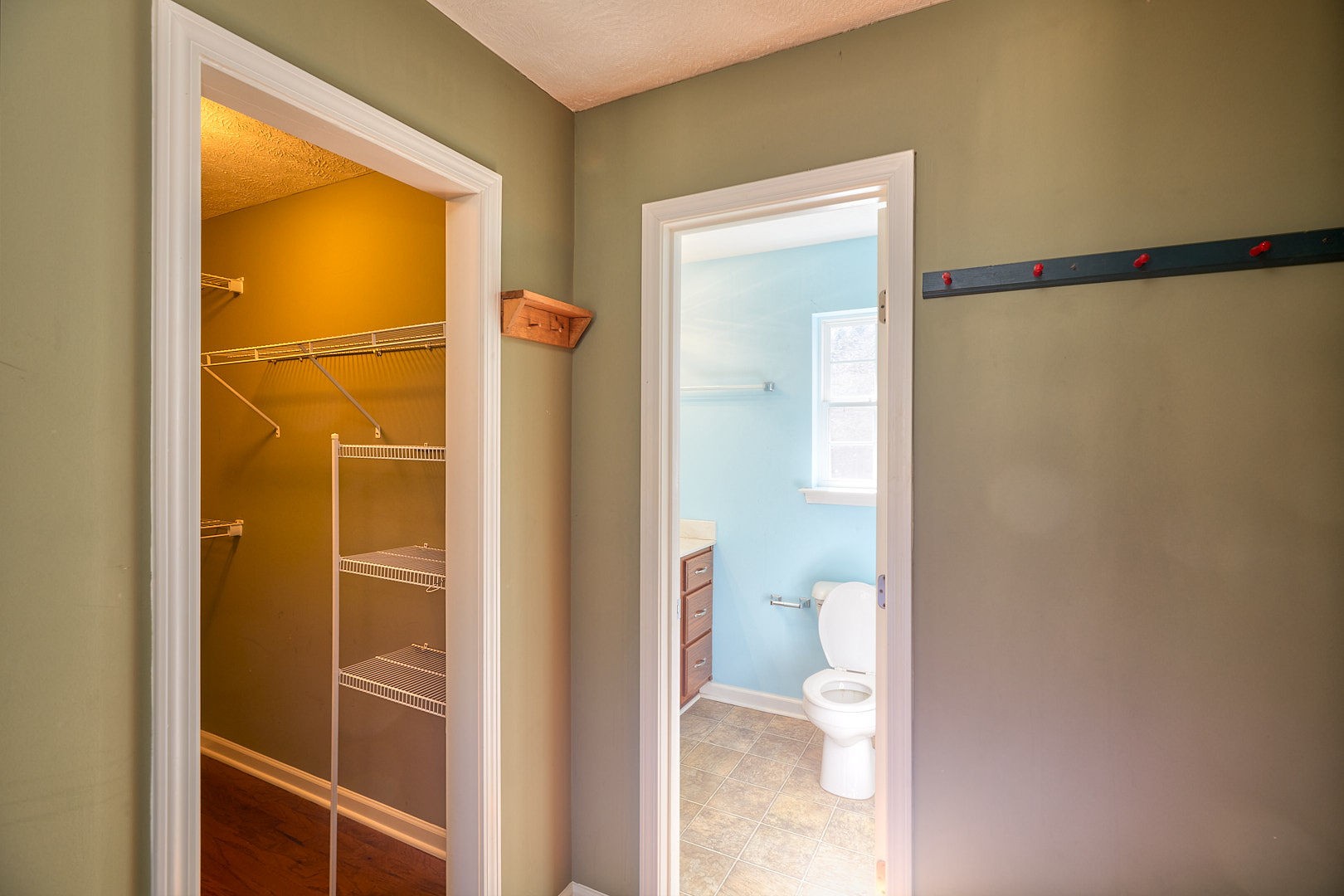 7042 Murfreesboro Road Lebanon, TN 37090 - Photo 29 of 43 a bathroom with a glass shower door and a toilet