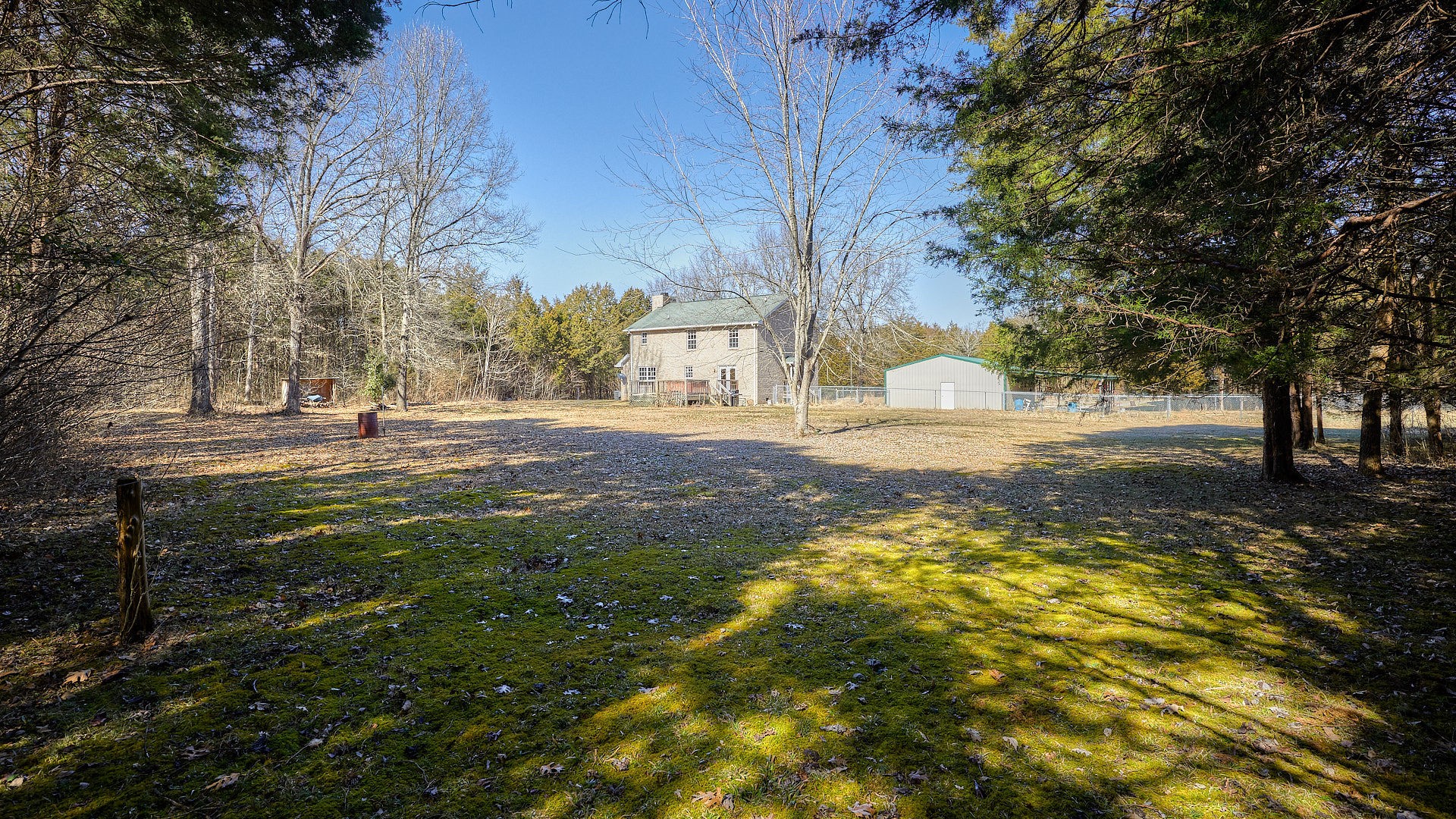 7042 Murfreesboro Road Lebanon, TN 37090 - Photo 36 of 43 a view of a yard with large trees