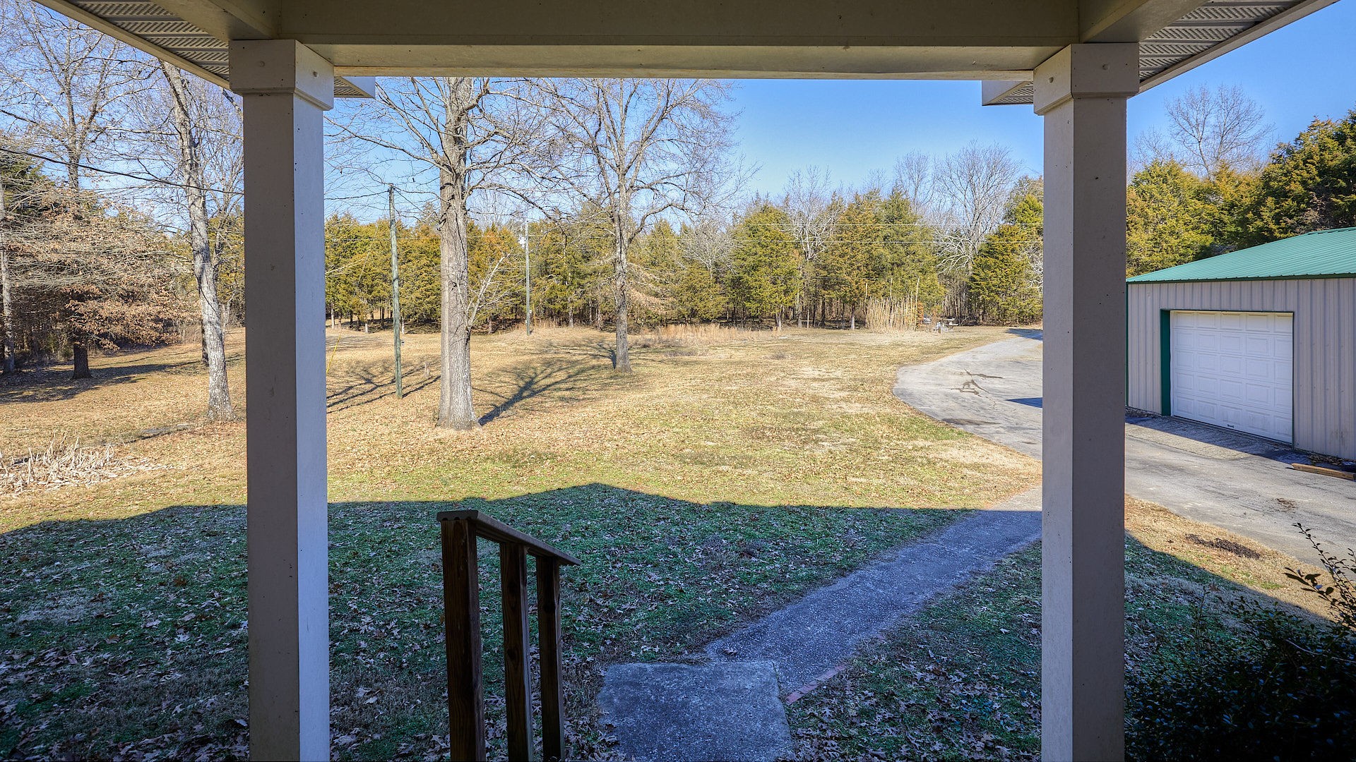 7042 Murfreesboro Road Lebanon, TN 37090 - Photo 37 of 43 a view of a porch with a yard