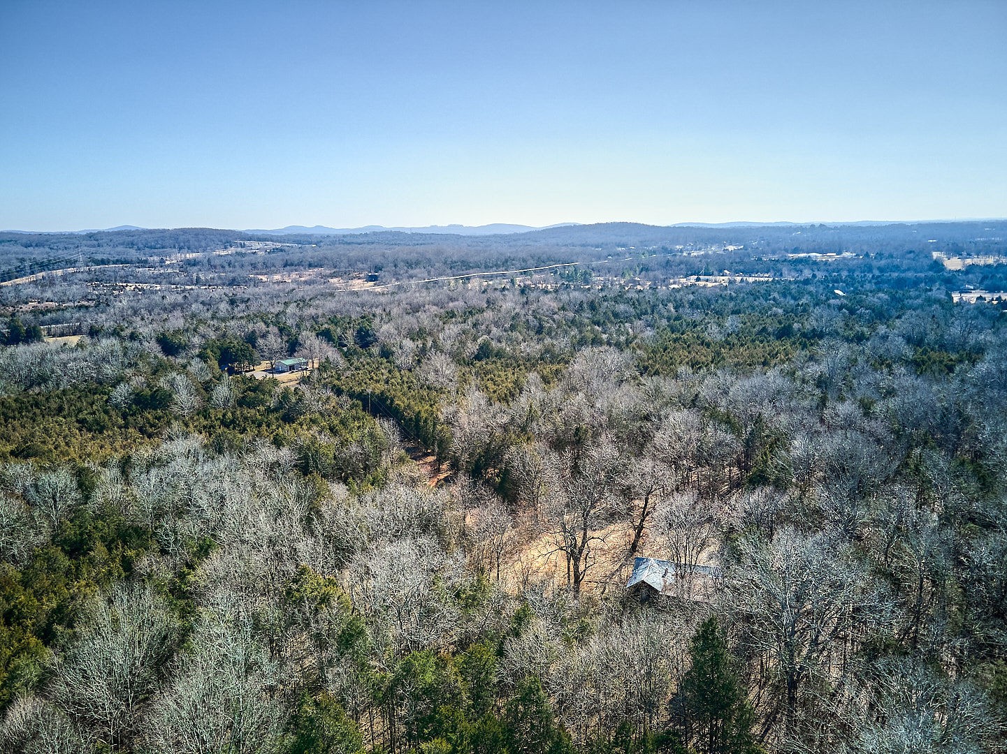 7042 Murfreesboro Road Lebanon, TN 37090 - Photo 43 of 43 an aerial view of house with yard and mountain view in back