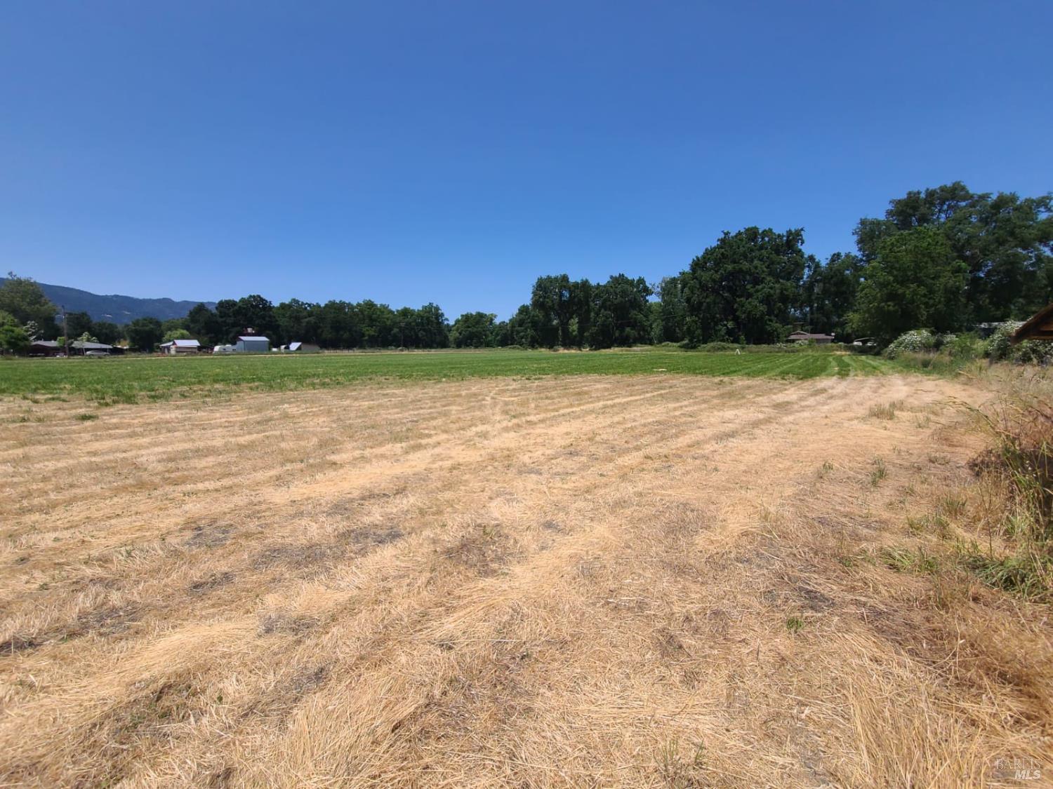 24450 Wattenburg Road Covelo, CA 95428 - Photo 3 of 11 a view of lake view and mountain view
