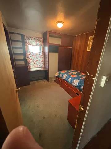 a bathroom with a sink toilet mirror and tub