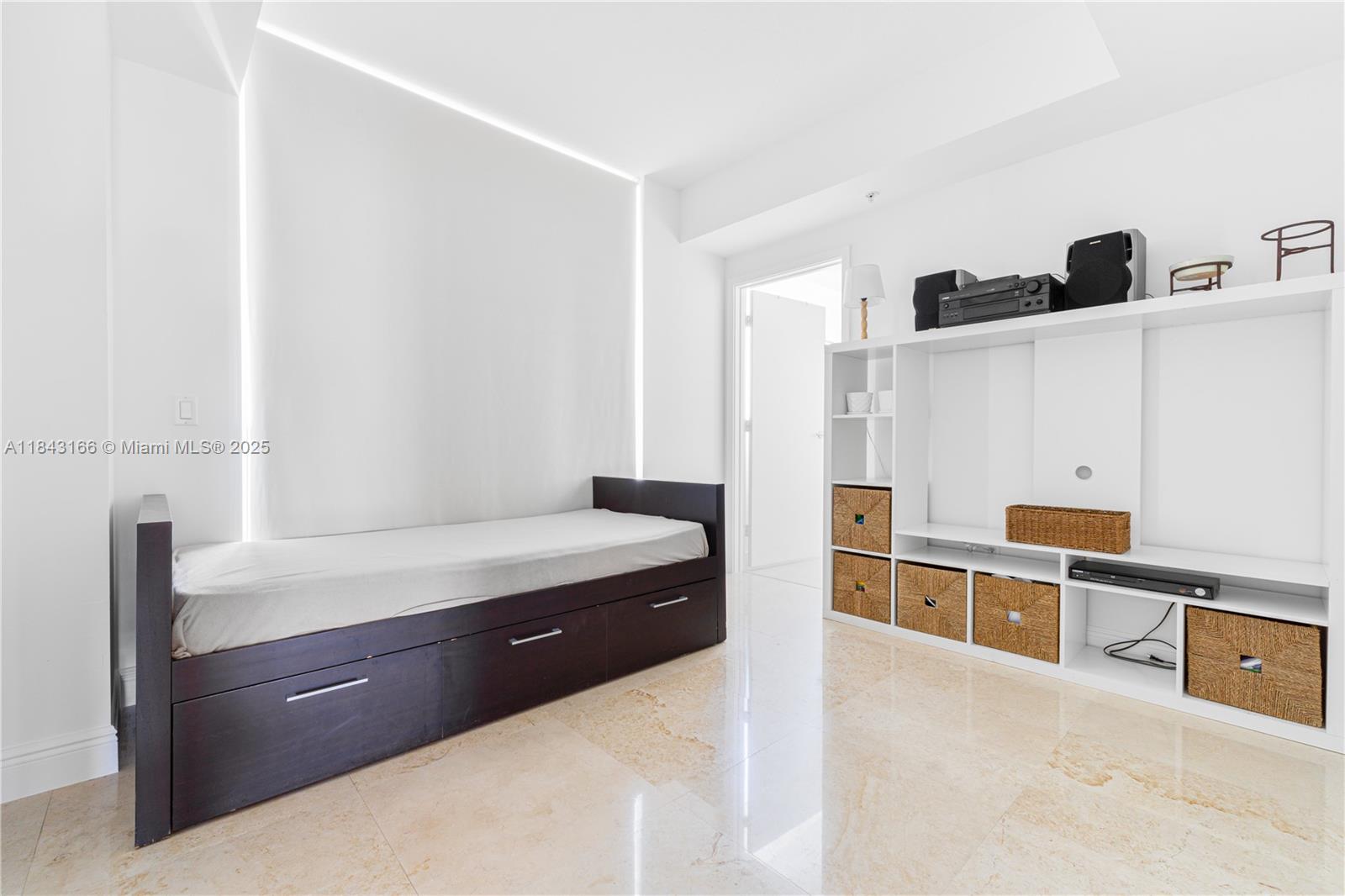 3801 Collins Avenue, Unit 1105 Miami Beach, FL 33140 - Photo 25 of 45 a spacious bathroom with a tub shower and sink