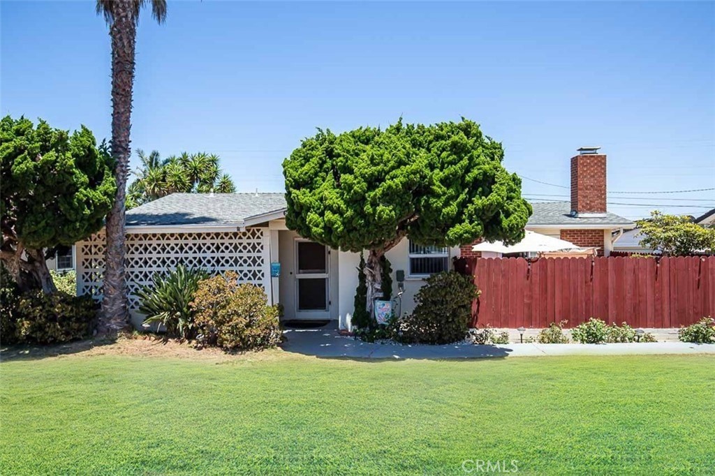 5140 Los Robles Drive Carlsbad, CA 92008 - Photo 1 of 1 a front view of a house with garden