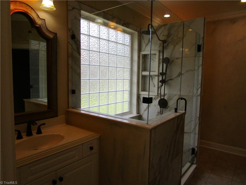 2320 Addison Boulevard High Point, NC 27262 - Photo 23 of 40 Master Bathroom with Gorgeous Tiled Shower
