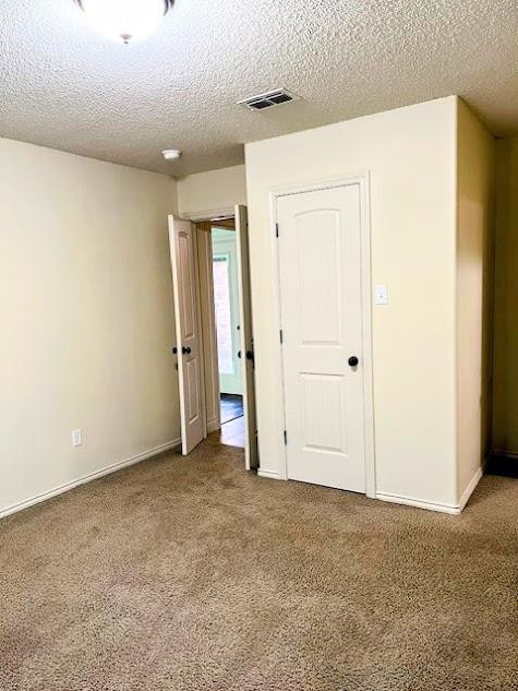 3913 100th Street Lubbock, TX 79423 - Photo 16 of 35 an empty room with closet area