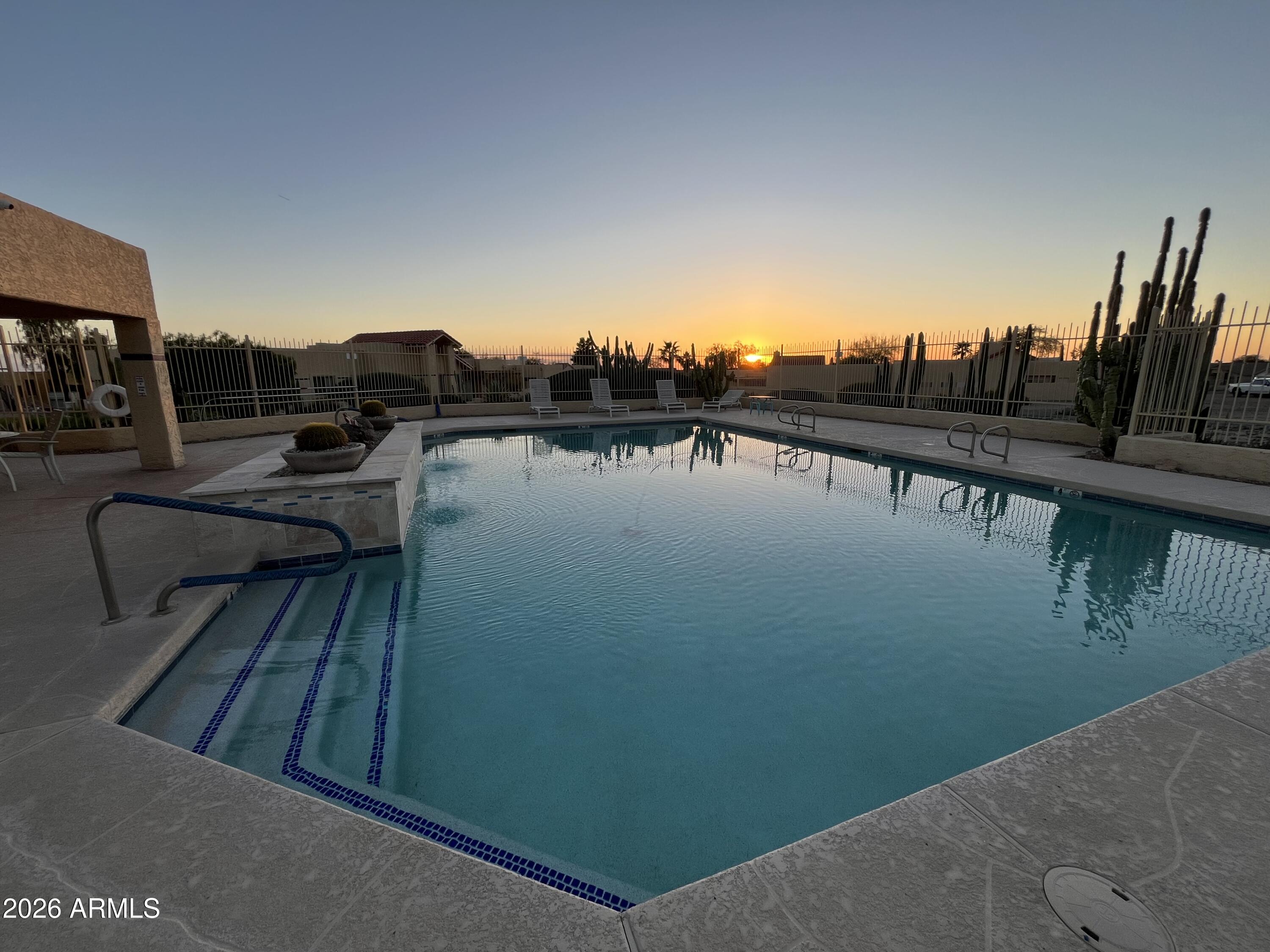 6123 South Kings Ranch Road Gold Canyon, AZ 85118 - Photo 26 of 34 community pool at dusk