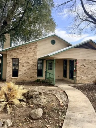 a view of a house with a patio