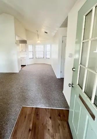 a view of kitchen and a sink
