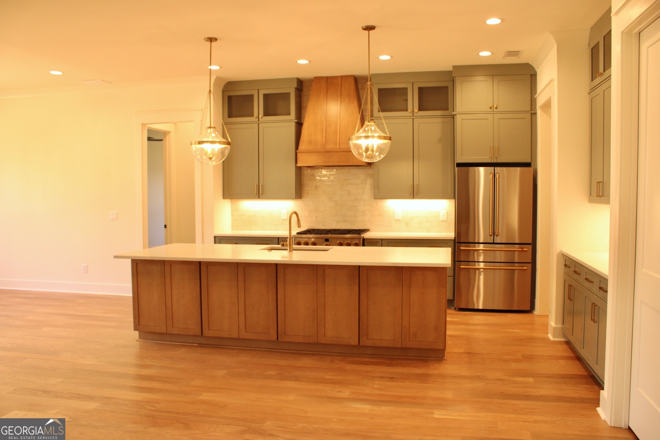 3.32 Ac Harp Road Fayetteville, GA 30215 - Photo 8 of 31 a kitchen with stainless steel appliances granite countertop a refrigerator and a sink