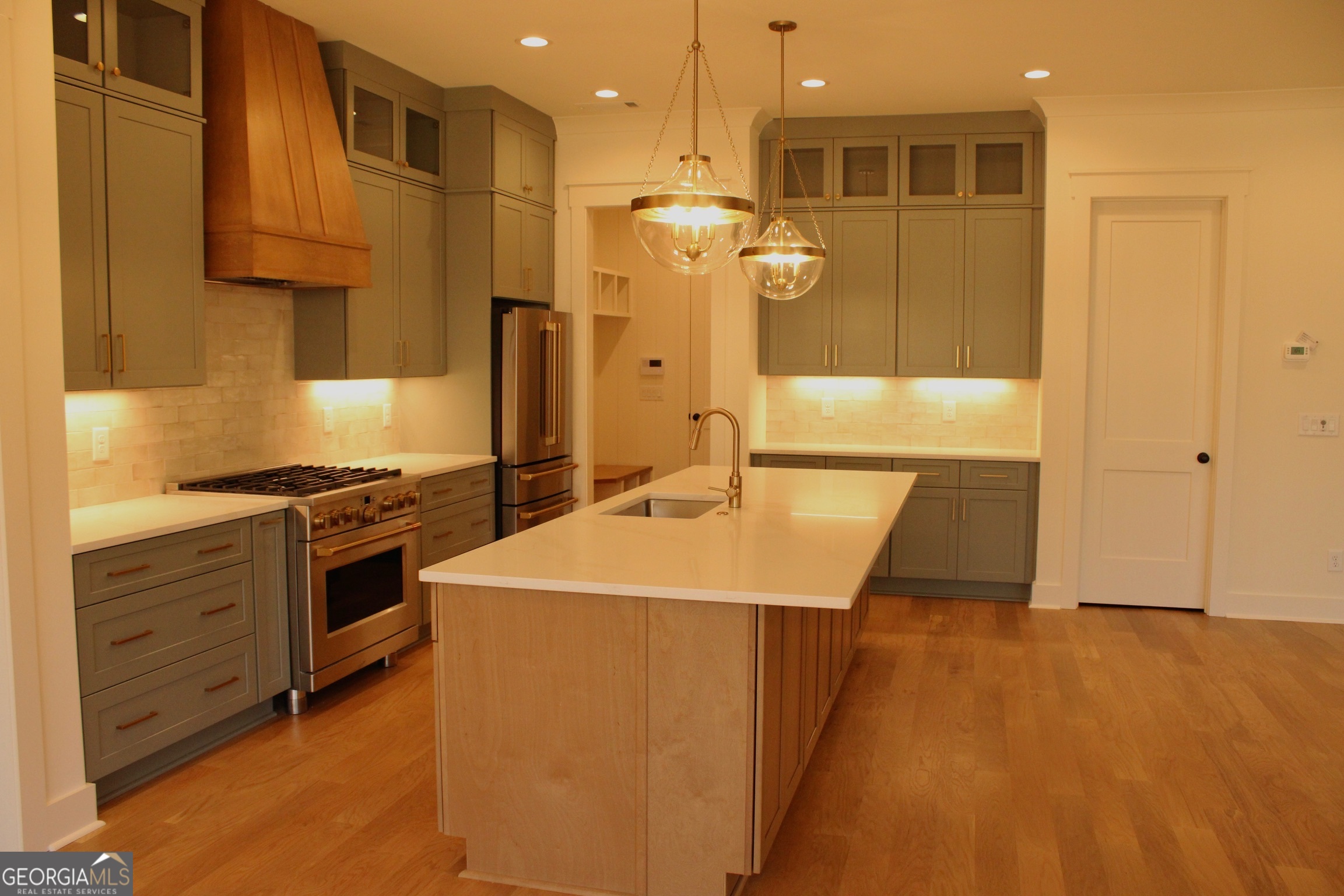 3.32 Ac Harp Road Fayetteville, GA 30215 - Photo 10 of 31 a kitchen with stainless steel appliances granite countertop a sink a stove and a refrigerator