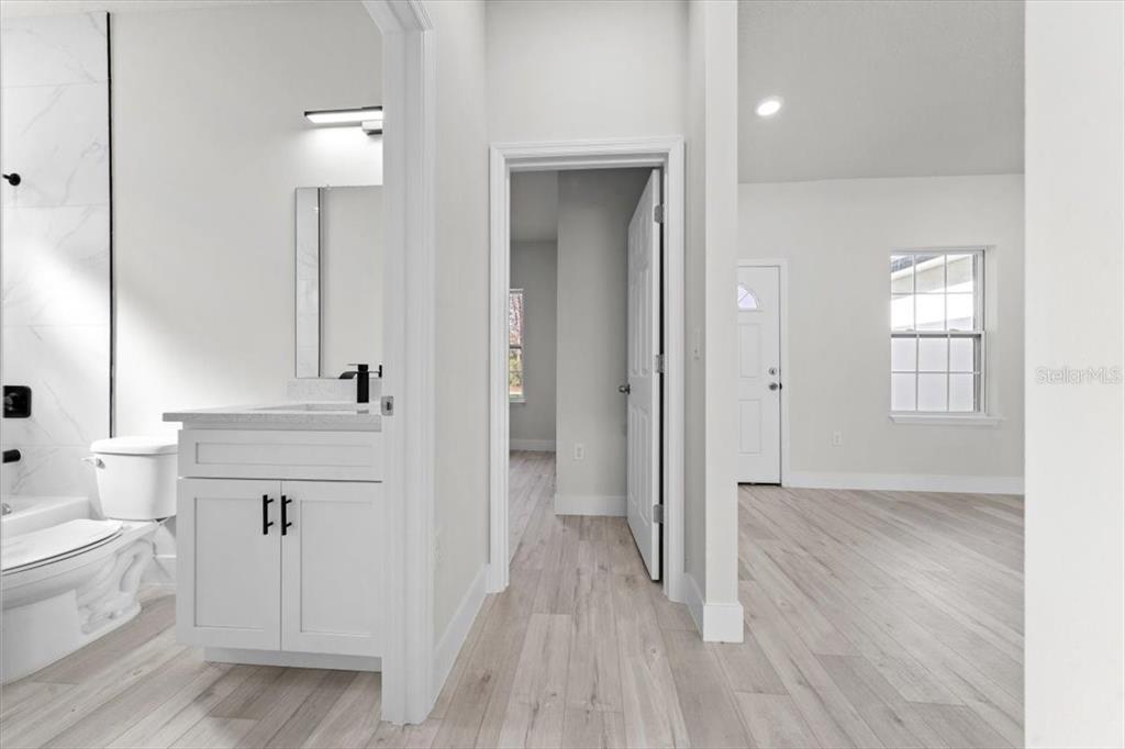 15495 Southwest 49th Avenue Road Ocala, FL 34473 - Photo 26 of 65 wooden floor with white walls