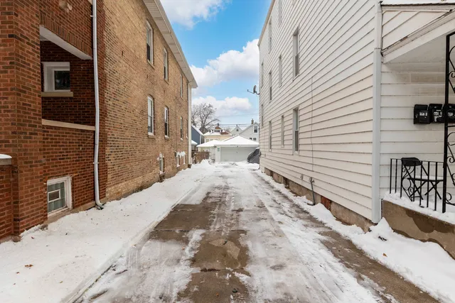 a view of a balcony with chairs