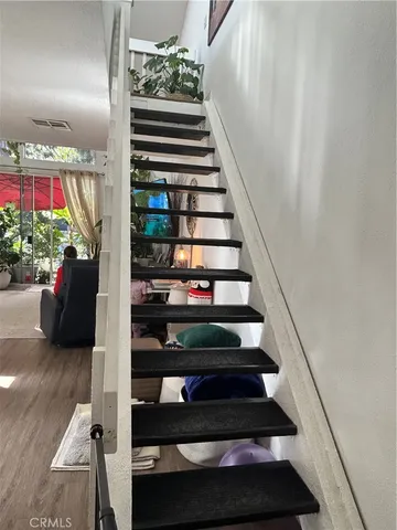 a view of entryway with wooden floor