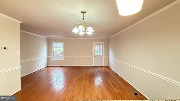 a view of livingroom with hardwood floor and window