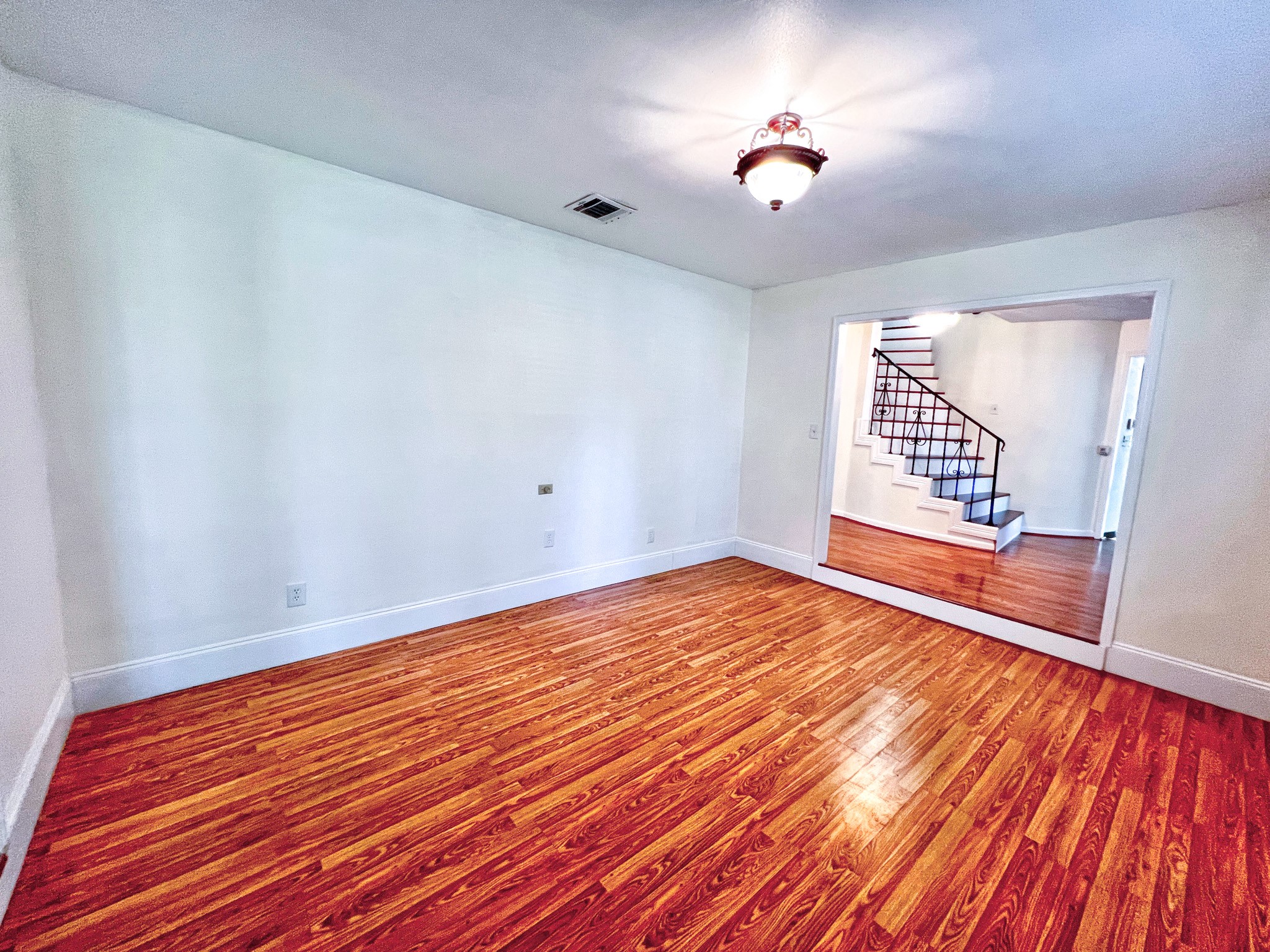 16902 Summit Oaks Lane Spring, TX 77379 - Photo 11 of 49 wooden floor in an empty room with a window