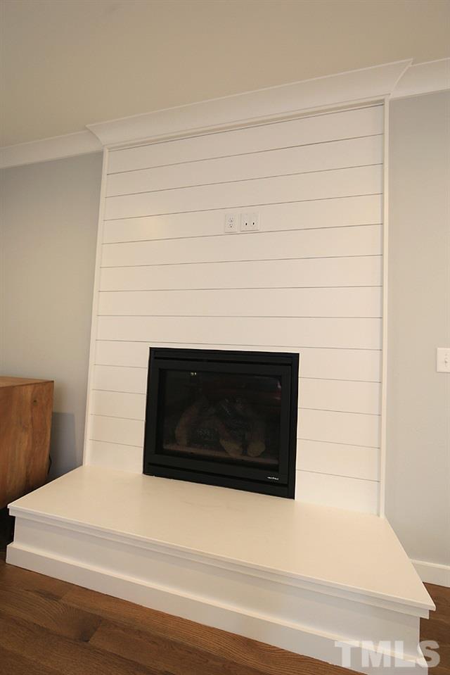 521 Bart Street Raleigh, NC 27610 - Photo 8 of 29 a close view of a fireplace